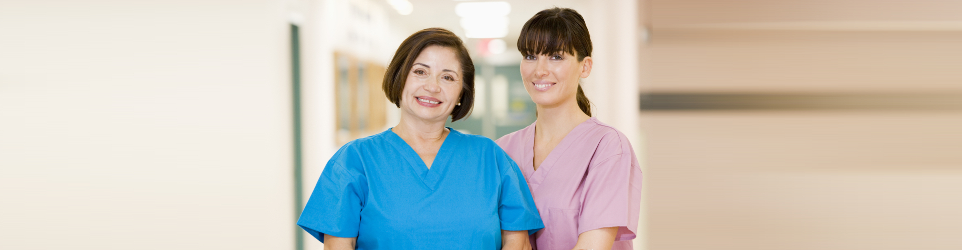 caregivers smiling at the camera